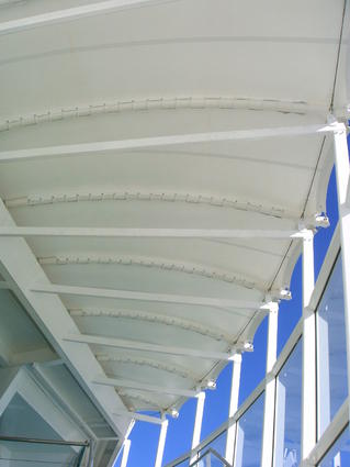 Textile canopy on a stairway by ACS Production, sun shade structure, tensioned fabric canopy
